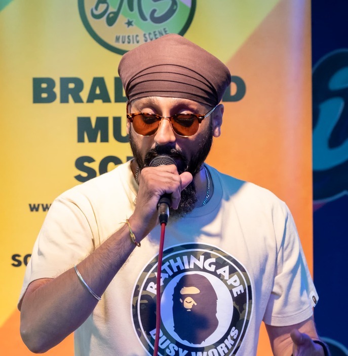 Bradford artist performing on the BMS stage at the Darley St takeover